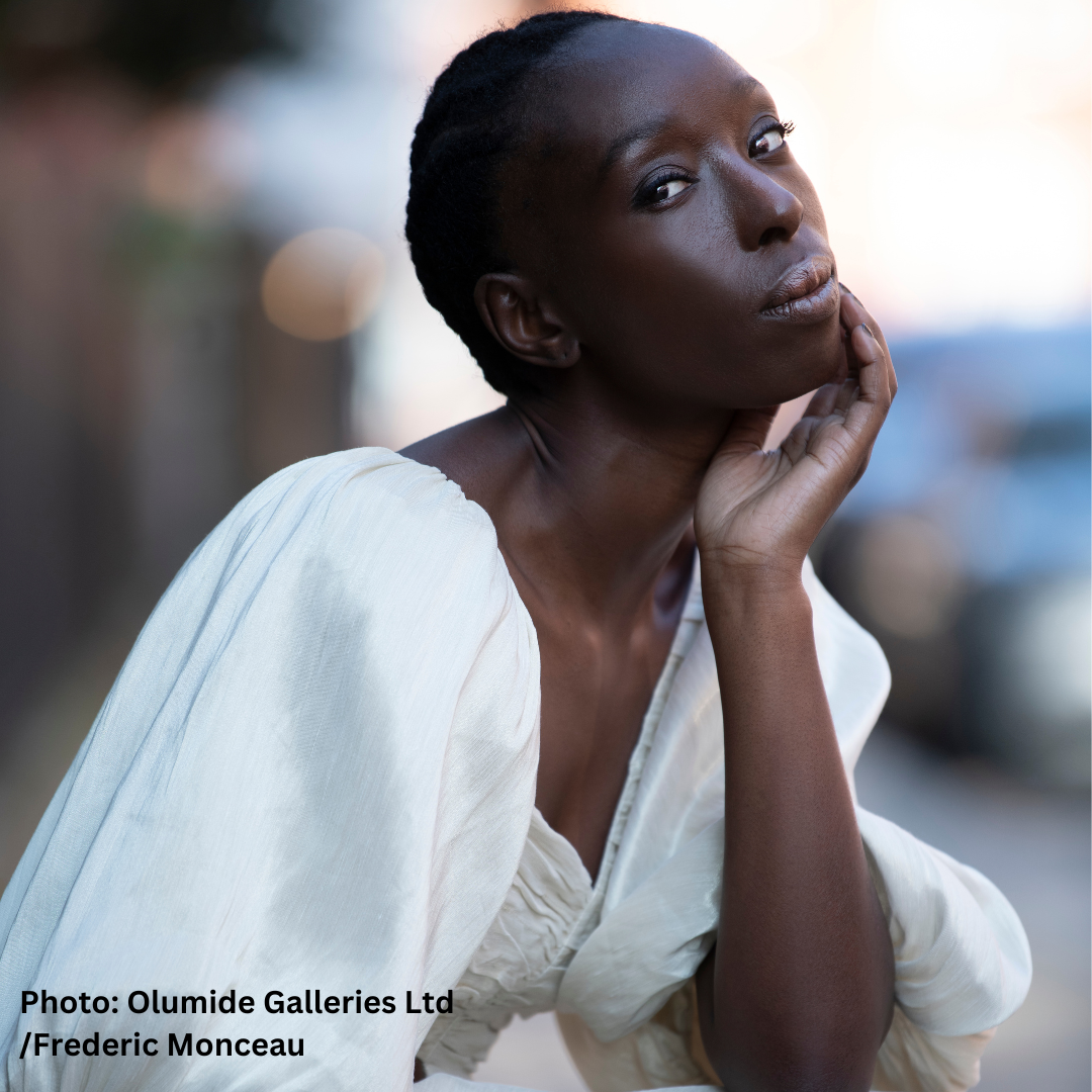 Eunice Olumide wearing a white dress